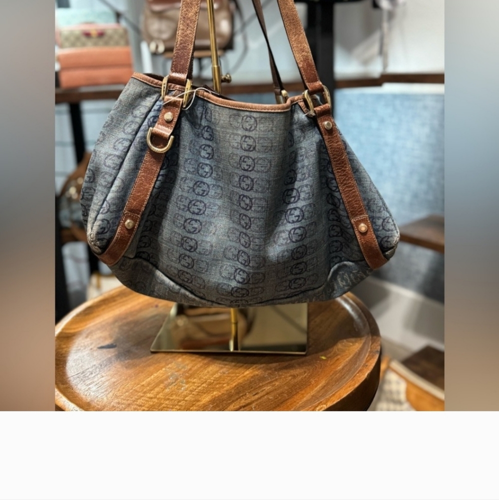 Gucci blue denim monogram tote with snap closure